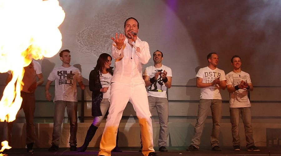 guy singing on stage